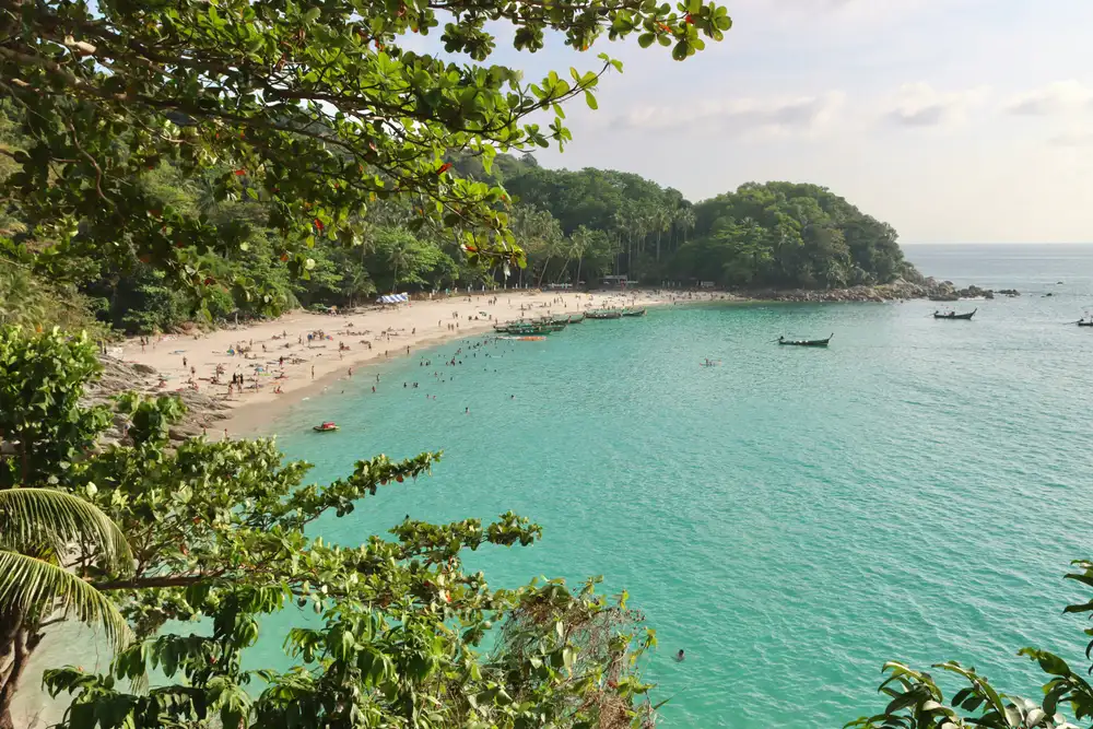 Freedom Beach Phuket, a secluded white-sand cove reached by longtail boat from Patong