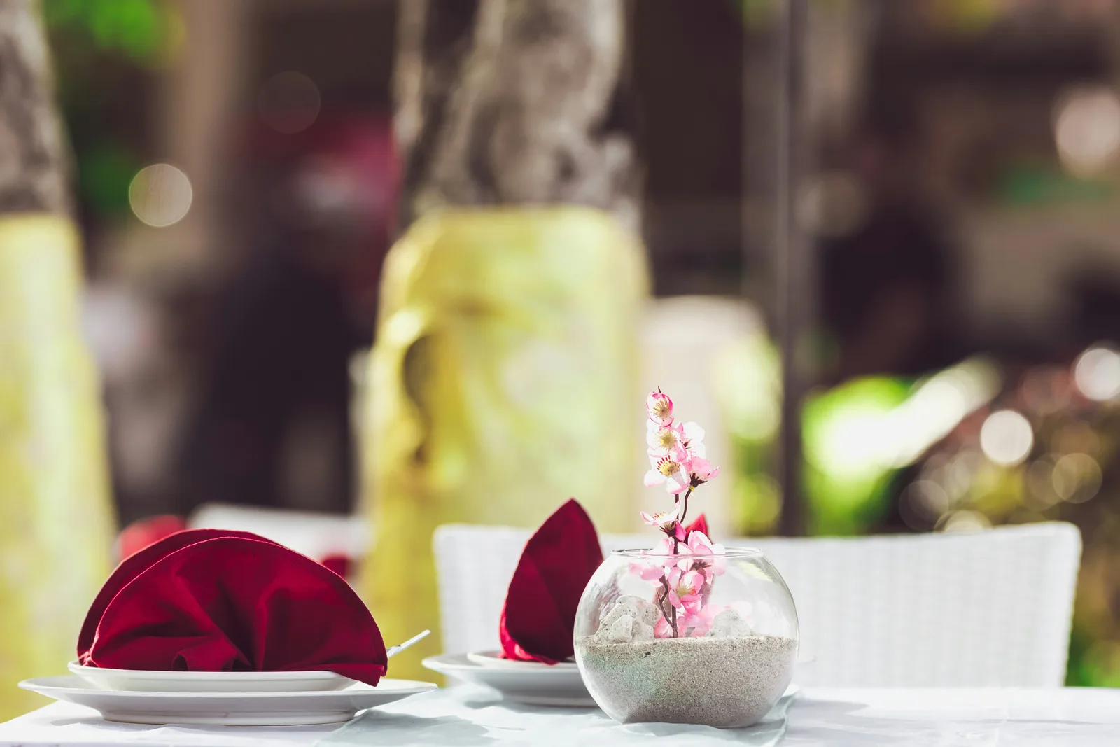 Sunset dinner table for two at one of the most romantic restaurants Phuket has, overlooking the Andaman Sea